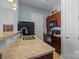 Updated kitchen featuring stainless steel appliances, granite countertops, and wood cabinets at 1101 W 1St St # 124, Charlotte, NC 28202