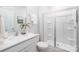 Bright bathroom features a white shower, modern sink, and sleek finishes providing a clean, contemporary feel at 11205 Cardinal Creek Ave, Charlotte, NC 28215