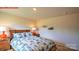Comfortable bedroom featuring carpeted floors, natural light, and colorful decor at 11205 Cardinal Creek Ave, Charlotte, NC 28215