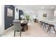 Open-concept living area with dining space and kitchen, great for gatherings and entertaining at 11205 Cardinal Creek Ave, Charlotte, NC 28215