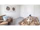 Modern office space features a brown leather chair and a rustic wood desk, ideal for productivity and comfort at 11205 Cardinal Creek Ave, Charlotte, NC 28215