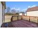 Spacious wooden deck overlooking the backyard and detached outbuilding at 114 Glen Rae Sw St, Concord, NC 28025