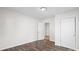 Bedroom with wood-look flooring and closet at 114 Glen Rae Sw St, Concord, NC 28025