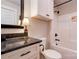 Bathroom with granite topped vanity, white fixtures, white cabinet and tub/shower combo at 121 Stone Crest Rd, Shelby, NC 28152