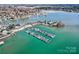 Aerial view of a marina with boat docks on Lake Norman, NC, showcasing a vibrant waterfront community at 127 Lakewood Circle Dr, Mooresville, NC 28117