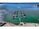 Aerial view of a marina with boat docks on Lake Norman, NC, revealing beautiful views of the lake at 127 Lakewood Circle Dr, Mooresville, NC 28117