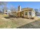Charming home featuring a cozy back patio, perfect for outdoor dining and relaxation at 127 Lakewood Circle Dr, Mooresville, NC 28117
