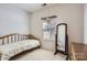 Bedroom featuring a large mirror, neutral carpet, white walls, and minimal furnishings at 127 Lakewood Circle Dr, Mooresville, NC 28117