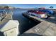 View of a boat slip with boats docked on a sunny day at 127 Lakewood Circle Dr, Mooresville, NC 28117