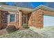 Close up exterior view of the brick home entrance at 127 Lakewood Circle Dr, Mooresville, NC 28117