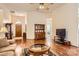 Bright living room with hardwood floors and ample space for furnishings at 127 Lakewood Circle Dr, Mooresville, NC 28117