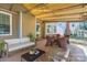 Virtually staged outdoor patio featuring a seating area and a dining table at 127 Lakewood Circle Dr, Mooresville, NC 28117