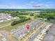 Aerial view of a neighborhood, showing the home's location near Carowinds theme park at 13044 Cottage Crest Ln, Charlotte, NC 28273