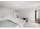 Bedroom features plush carpet, neutral walls, and a door to the bathroom at 13044 Cottage Crest Ln, Charlotte, NC 28273