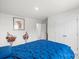 Comfortable bedroom features soft bedding, neutral walls, and a door to the closet at 13044 Cottage Crest Ln, Charlotte, NC 28273