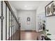 Welcoming foyer with hardwood floors, decorative door, staircase, and adjacent office at 13044 Cottage Crest Ln, Charlotte, NC 28273