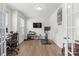 Bright office space with French doors, ample natural light, and wood floors at 13044 Cottage Crest Ln, Charlotte, NC 28273