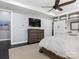 Bedroom showing a king size bed, dresser and storage at 13114 Long Common Pkwy, Huntersville, NC 28078