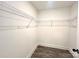 Walk-in closet features white walls, wood-look flooring, and wire shelving for ample storage space at 1350 Russell St, Rock Hill, SC 29730
