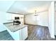 Eat-in kitchen features stainless steel appliances, granite countertops, white cabinets, and modern lighting at 1350 Russell St, Rock Hill, SC 29730