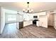 Kitchen showcases granite counters, stainless appliances, white cabinets, and an island with a sink and faucet at 1350 Russell St, Rock Hill, SC 29730