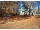 Secluded lot featuring a wooded pathway, perfect for nature lovers and those seeking a private retreat at 14818 Hooks Rd, Matthews, NC 28105