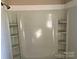 Shower and tub combo featuring built-in shelving at 1610 India Hook Rd # 26, Rock Hill, SC 29732