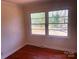 Well-lit bedroom with hardwood floors and plenty of sunlight at 1610 India Hook Rd # 26, Rock Hill, SC 29732