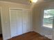 Bedroom with closet, window and hardwood floors at 1610 India Hook Rd # 26, Rock Hill, SC 29732