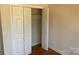 Bedroom closet features bi-fold doors and interior shelving at 1610 India Hook Rd # 26, Rock Hill, SC 29732