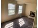 Cozy living room with a fireplace, soft carpet and natural light at 1610 India Hook Rd # 26, Rock Hill, SC 29732