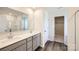 Well-lit bathroom with double vanity, modern fixtures, and a glass-enclosed shower at 1705 Wooten Way, Bessemer City, NC 28016