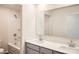 Bathroom featuring double vanity, a large mirror, and a shower-tub combination at 1705 Wooten Way, Bessemer City, NC 28016