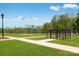 Community park with walking paths, swing sets, and open green spaces for recreation and relaxation at 1705 Wooten Way, Bessemer City, NC 28016