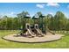 Community playground featuring slides and climbing structures provides outdoor fun for residents at 1705 Wooten Way, Bessemer City, NC 28016