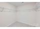 Spacious walk-in closet with metal shelving offering plenty of storage space at 1705 Wooten Way, Bessemer City, NC 28016