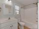 Clean bathroom featuring a shower-tub combo and a white vanity with chrome fixtures at 2100 Winding Oaks Trl, Waxhaw, NC 28173