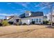 Charming home with a well-manicured lawn and patio space, perfect for outdoor living at 2172 Paddlers Cove Dr, Clover, SC 29710