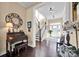 Welcoming foyer with hardwood floors, staircase, and decorative furnishings at 2172 Paddlers Cove Dr, Clover, SC 29710