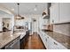 Spacious kitchen includes a farmhouse sink, stainless steel appliances, and ample counter space at 2172 Paddlers Cove Dr, Clover, SC 29710