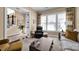 Relaxing living room featuring plush seating, large windows, and stylish décor at 2172 Paddlers Cove Dr, Clover, SC 29710