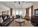 Comfortable living room with stylish furnishings, hardwood floors, and ample natural light at 2172 Paddlers Cove Dr, Clover, SC 29710