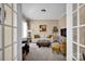 Bright living room with neutral décor, comfortable seating, and ample natural light at 2172 Paddlers Cove Dr, Clover, SC 29710