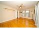 Bright bedroom with hardwood floors, neutral walls, and ceiling fan at 3039 N Center St # 10/C, Hickory, NC 28601