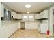 Well-lit kitchen with white cabinets, modern appliances, and durable countertops at 3039 N Center St # 10/C, Hickory, NC 28601
