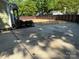Spacious backyard featuring a concrete area, perfect for outdoor activities and entertaining at 3332 Draper Ave, Charlotte, NC 28205
