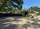 Large backyard and home exterior with ample parking space and privacy at 3332 Draper Ave, Charlotte, NC 28205