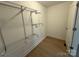 Walk-in closet with ample shelving provides organized storage at 3332 Draper Ave, Charlotte, NC 28205