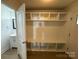 Mudroom with built in shelves, seating, and storage at 3332 Draper Ave, Charlotte, NC 28205