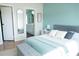 This stylish bedroom offers an attached full bath and neutral paint tones at 3991 Bunker Hill School Rd, Claremont, NC 28610